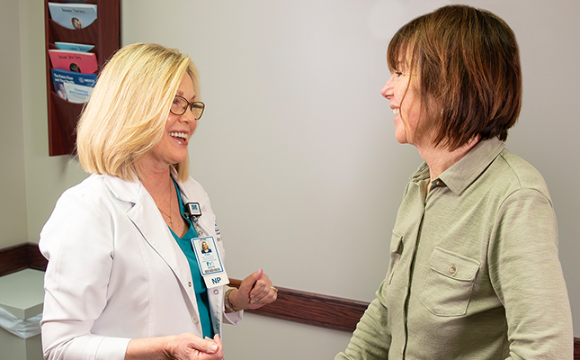 nurse practitioner with patient
