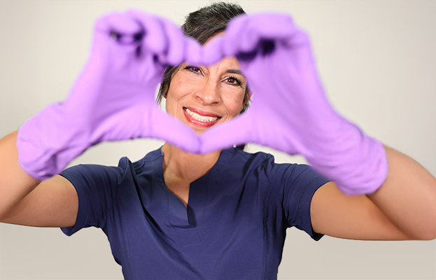 nurse with hands in heart shape