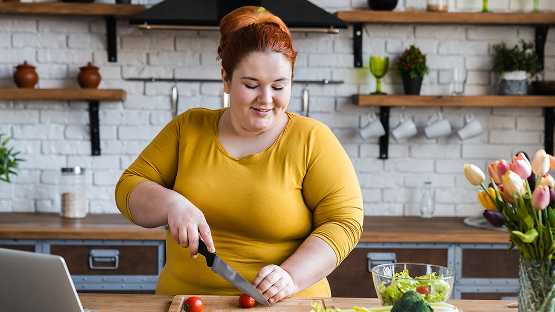 Woman chopping vegetables