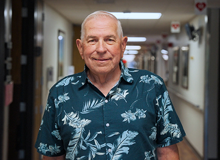 Don Higgins standing in hospital hallway