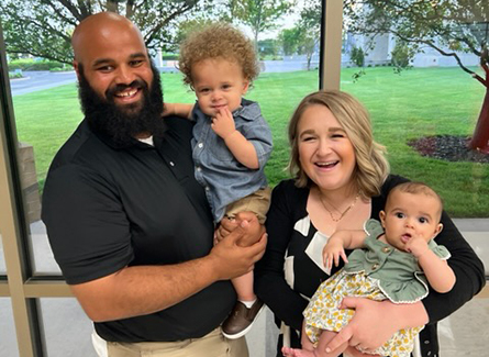 Ellie with her husband and two children