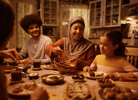 Muslim family having a meal during Ramadan