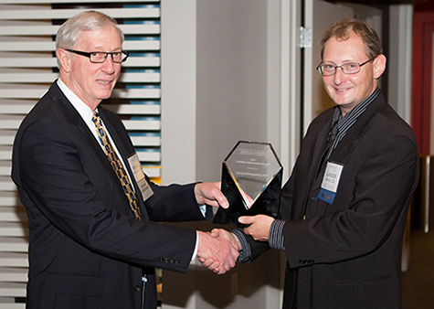 Dr. Montgomery receiving lifetime achievement award