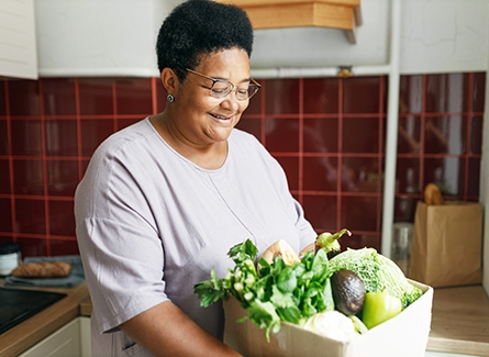 Woman with bag of groceries