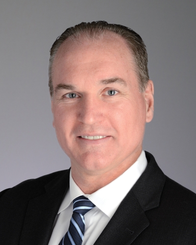 Robert E. Pluenneke, M.D.